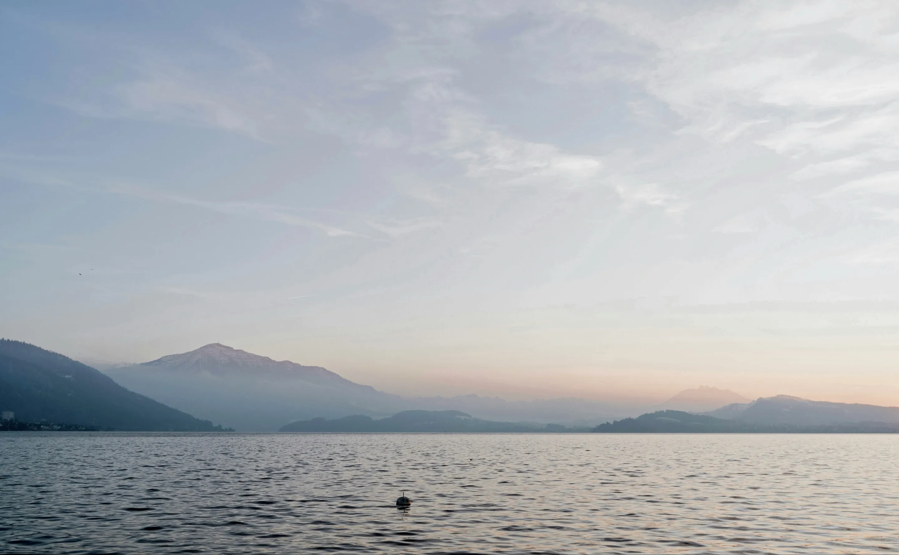 Lake and mountains at dusk, viewed from Lucerne, Switzerland